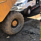 plant hire vehicle inner tube repaired on a building site near Bolton